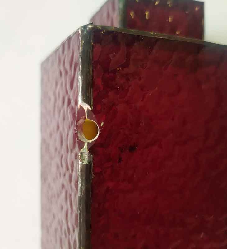 Full size view of drilling hole in roof
