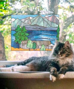 cat and stained glass mountain scene