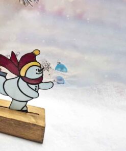 stained glass snowman on skates