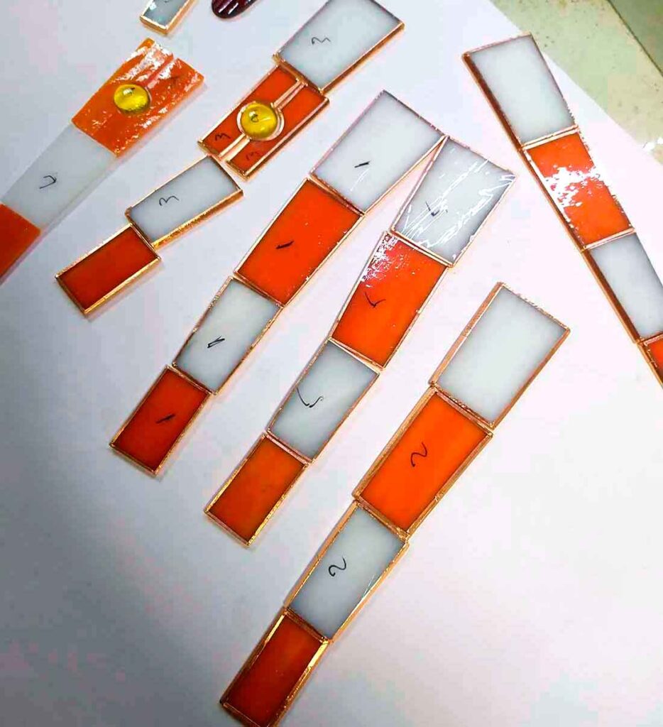 foil wrapped glass pieces for the lighthouse body