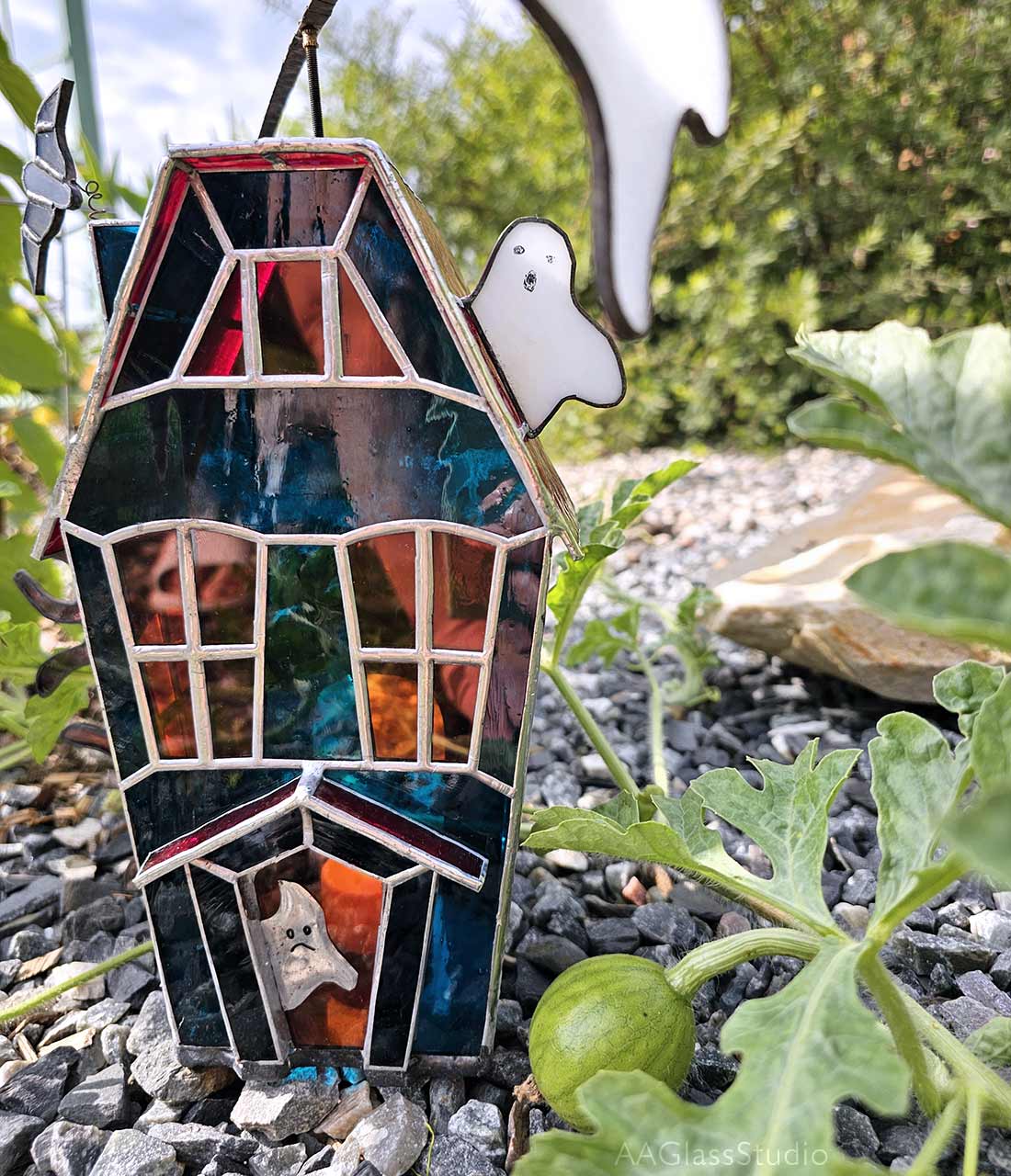 Spooky Halloween decor glowing beautifully on a windowsill, a creepy and cute addition to your home.