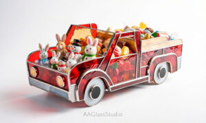 Digital stained glass pattern for 3D vintage pickup truck planter, DIY PDF template for Easter bunny decor, downloadable printable layout for glass art hobbyists.