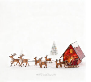 Snowy house scene with stained glass Christmas sleigh and reindeer in front of the home, Christmas tree