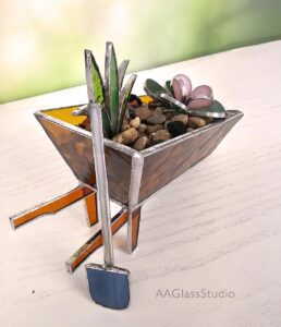 Finished 3D stained glass wheelbarrow filled with glass succulents