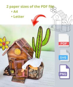 Handcrafted stained glass house featuring a small garden bed for flowers, with a vibrant yellow bloom in the background — perfect stained glass garden art accent.