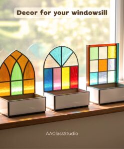 Three mini decorative window planters for succulents, handcrafted with a simple stained glass windows pattern.