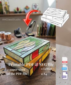 A stained glass stacked books lamp placed on a windowsill, showcasing intricate 3d stained glass craftsmanship with natural light glowing through the colorful glass layers.