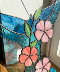 stained glass whale tail in flowers