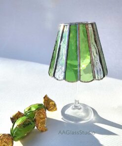 Displaying a beautiful green stained glass lampshade on a wine glass.