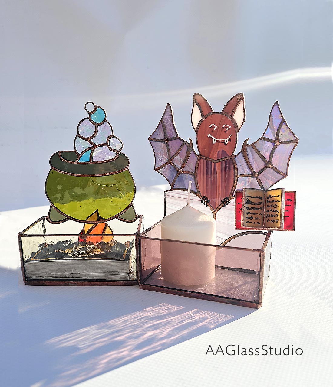 halloween stained glass patterns a bat with a spell book and a witch's cauldron with a fire