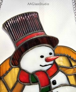 Boss Snowman stained glass pattern - close-up of the snowman face with top hat, carrot nose and striped scarf